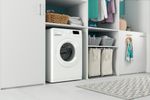 Indesit Lave-linge Pose-libre MTWE 71484 W FR Blanc Lave-linge frontal C Lifestyle perspective