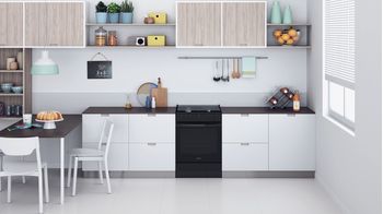 Indesit Cuisinière IS67M5PCB/FR/1 Noir Mixte Lifestyle frontal